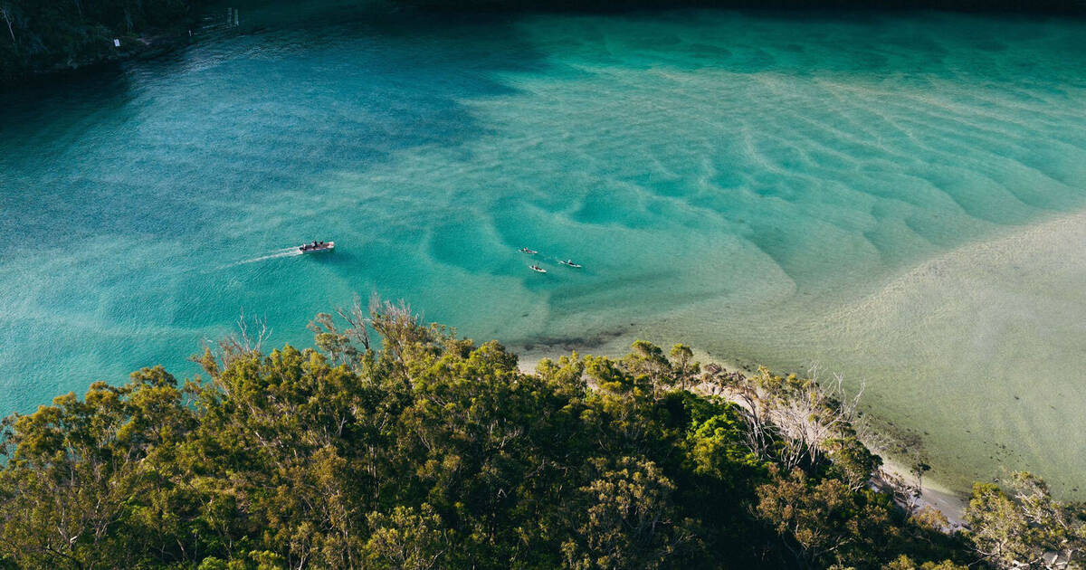 https://hampshireholidays.com.au/files/images/00-Local-Guide/Things-to-do-Merimbula/pambula-river-kayaking-sapphire-coast-nsw.jpg