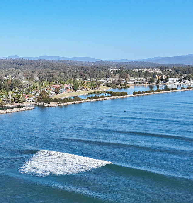 Aerial view across the water and coastline near Batemans Bay Marina Resort