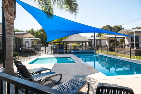 Heated, outdoor swimming pool at Geelong Holiday Park, perfect for relaxing after exploring Geelong.