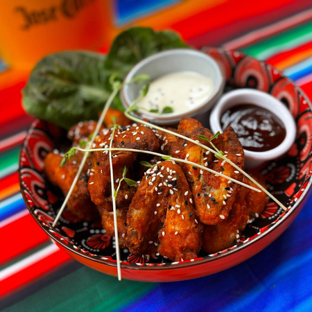 Mexican chicken wings with dipping sauces at The Mad Mexican Batemans Bay.