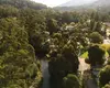 Aerial view of accommodation and camping areas and the Yarra River at Warburton Holiday Park in Warburton, Yarra Valley.