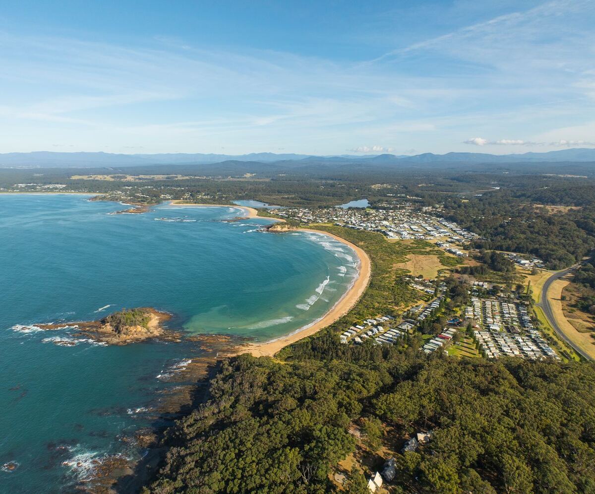 Aerial view of Barlings Beach caravan park and the Tomakin coastline
