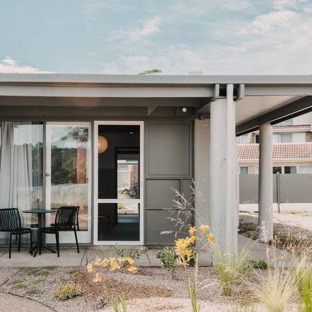 Motels in Merimbula: private courtyard entrance to a room at Black Dolphin Motel